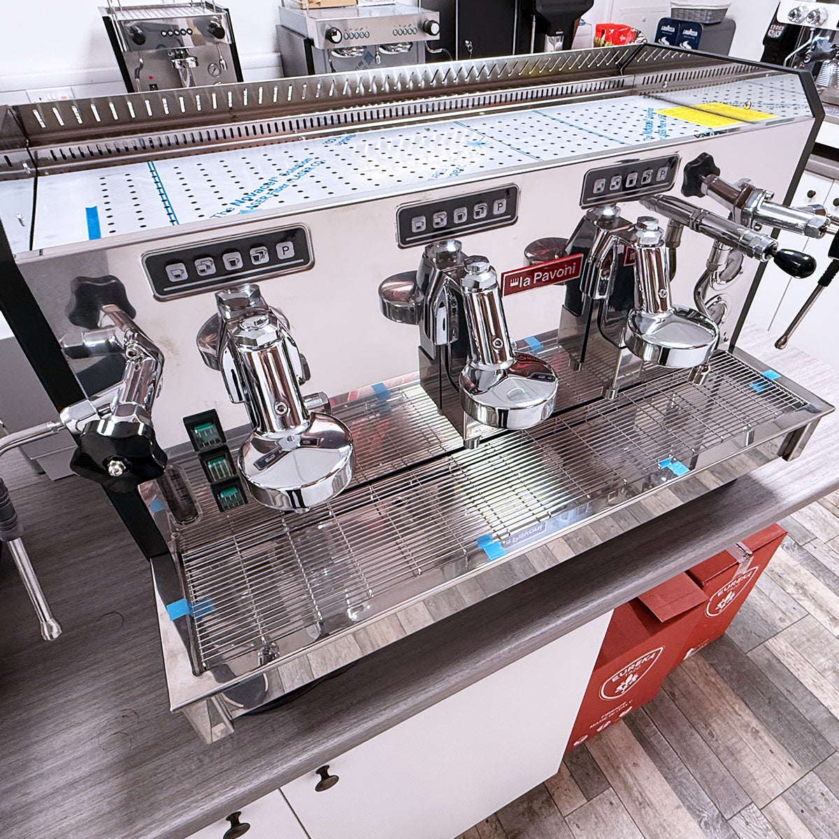 Pavoni Vasari 3 group espresso coffee machine in polished stainless steel, digital control panels.