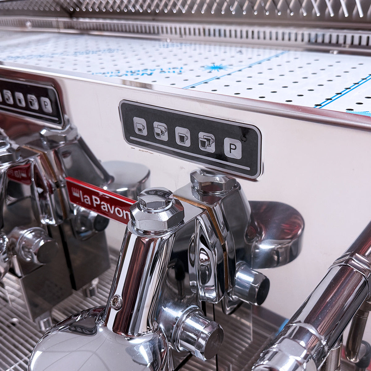 Pavoni Vasari 3 Group Commercial Espresso Machine. Showing grouphead and control buttons.