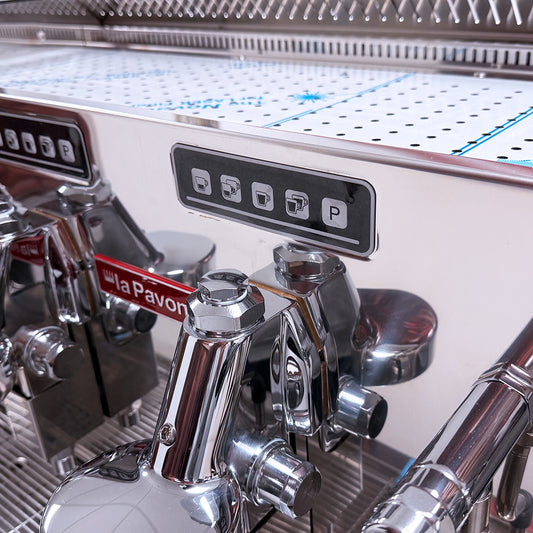 Pavoni Vasari 3 Group Commercial Espresso Machine. Showing grouphead and control buttons.